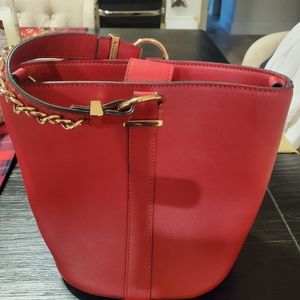 INC. RED PURSE